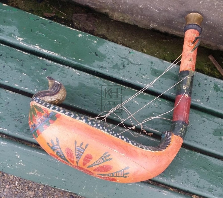 Bird headed string instrument