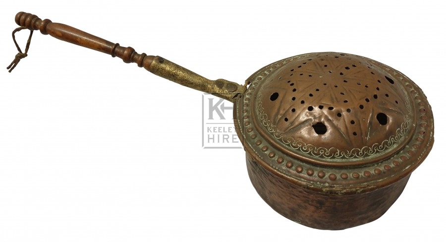 Ornate copper warming pan