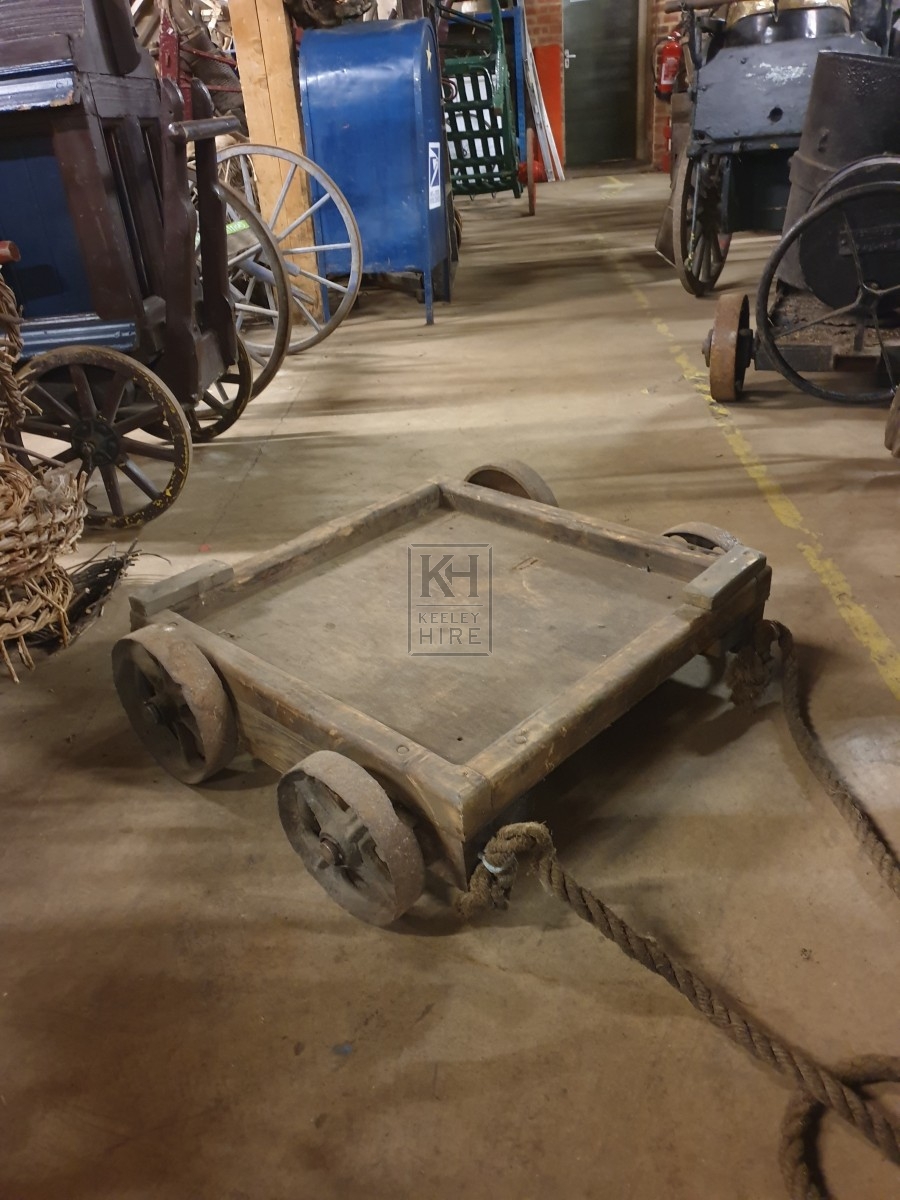 Small low trolley with iron wheels