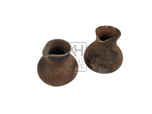 Small pottery pot with spout