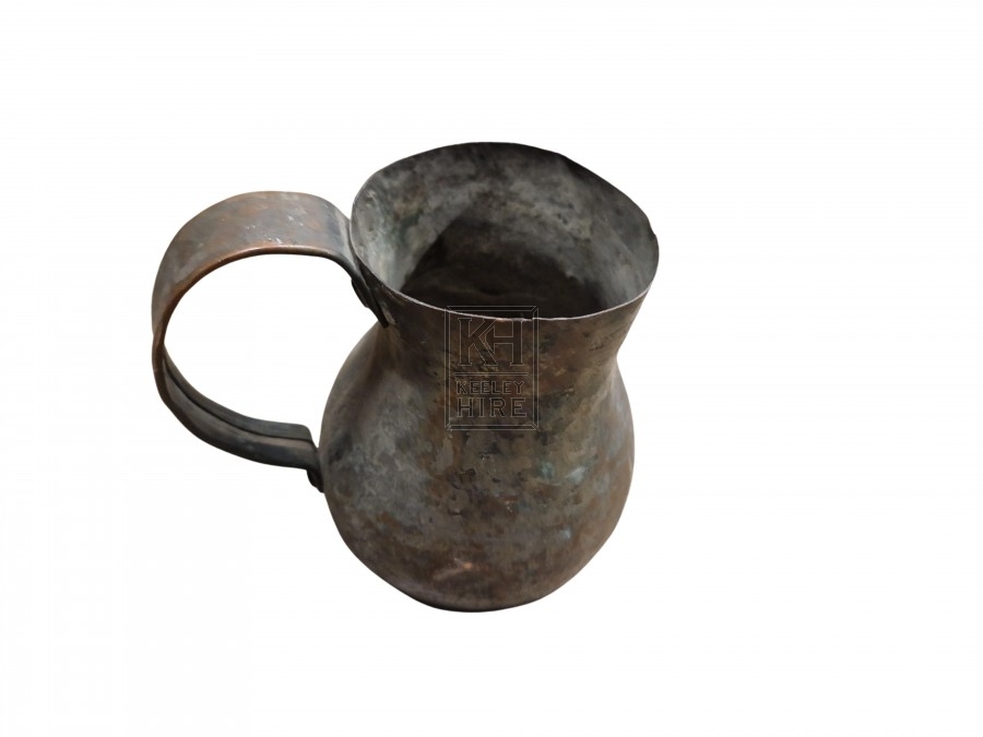 Assorted small copper metal jugs
