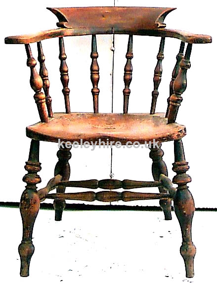 Round spindle back arm chair