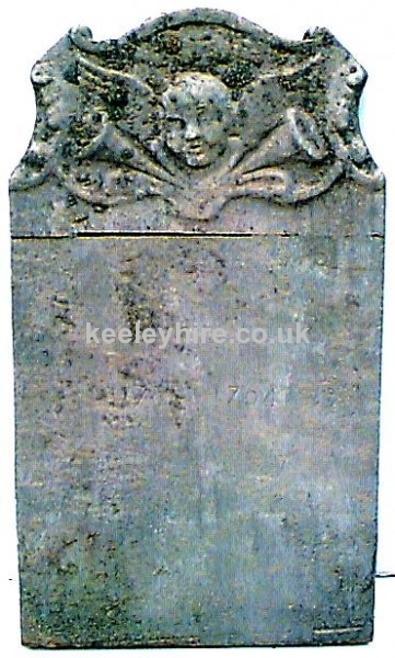 Gravestone with Cherub head and trumpet