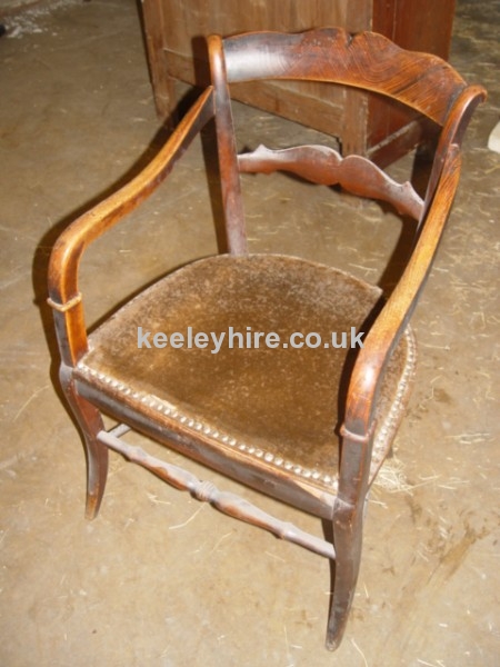 polished wood chair with leather seat