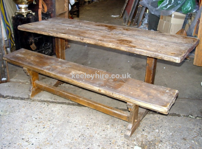 Dark wood table with bench