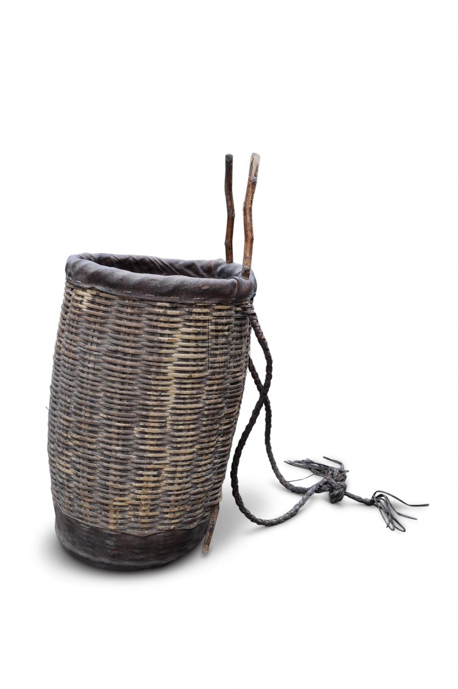 Wicker back basket with braided leather