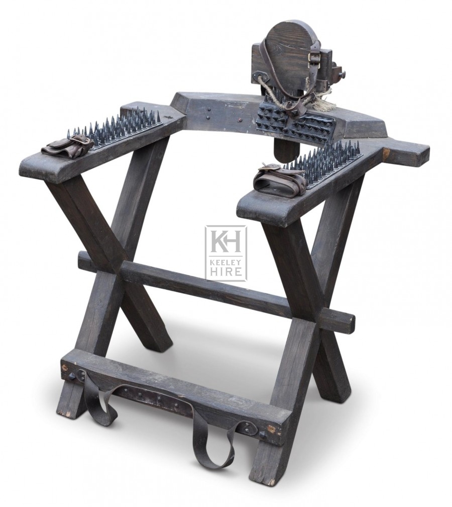 Torture chair with spikes