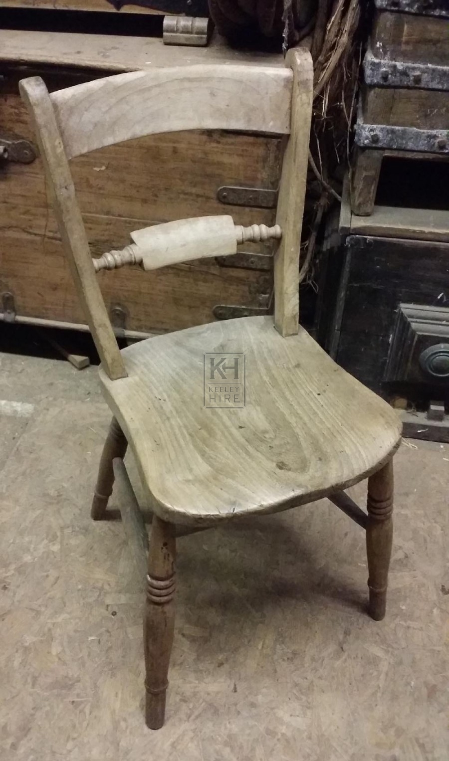 Plain wood light chair with bar back