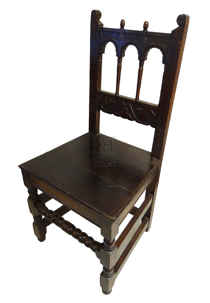 Dark wood polished chair with arches