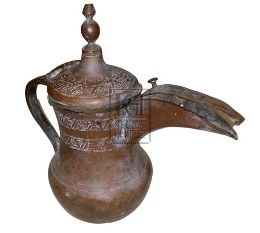 Ornate copper coffee pot