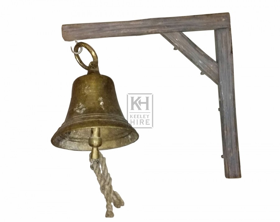 Brass bell on small wood bracket