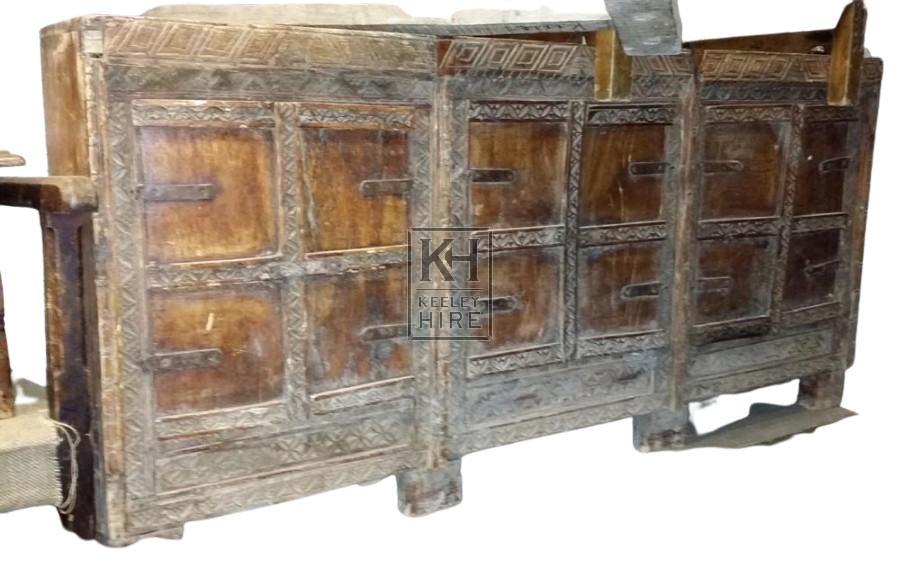 Carved wood narrow cupboard chest