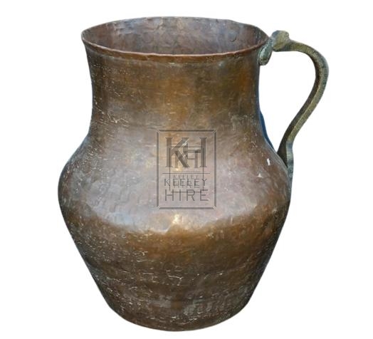 Wide bulbous copper jug