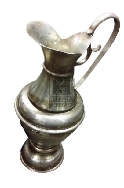 Silver ornate jug with handle
