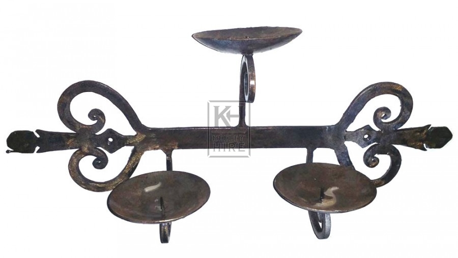 Ornate iron wall triple candle holder