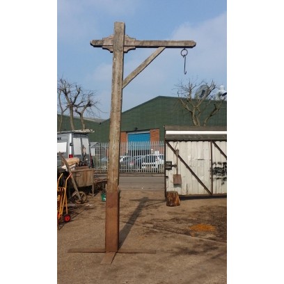 Tall wood gibbet post with arm & ring