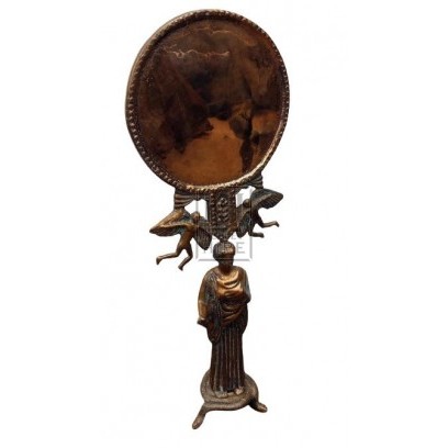 Ornate brass mirror